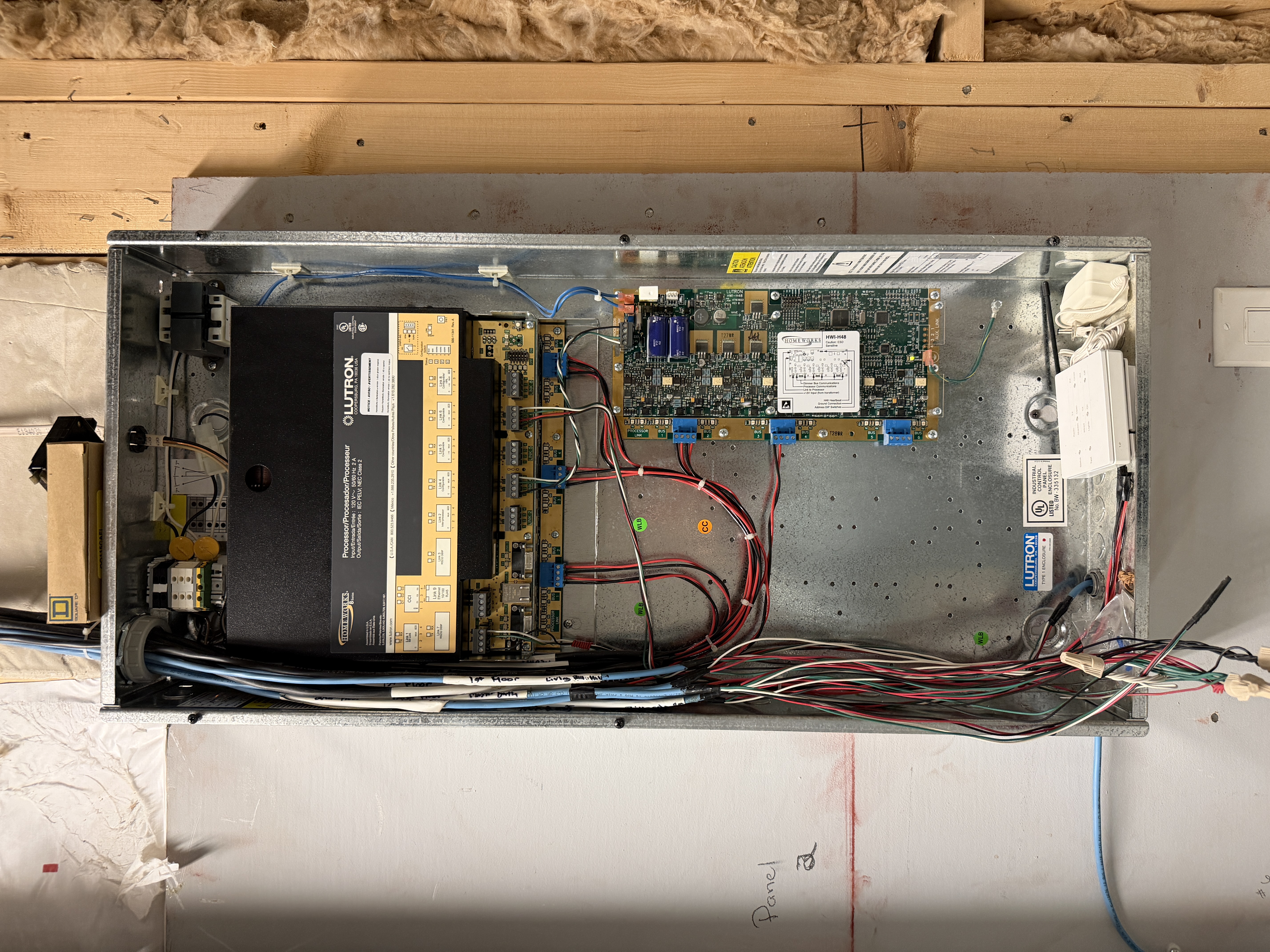 Lutron HomeWorks Illumination processor panel overview showing circuit board and connections