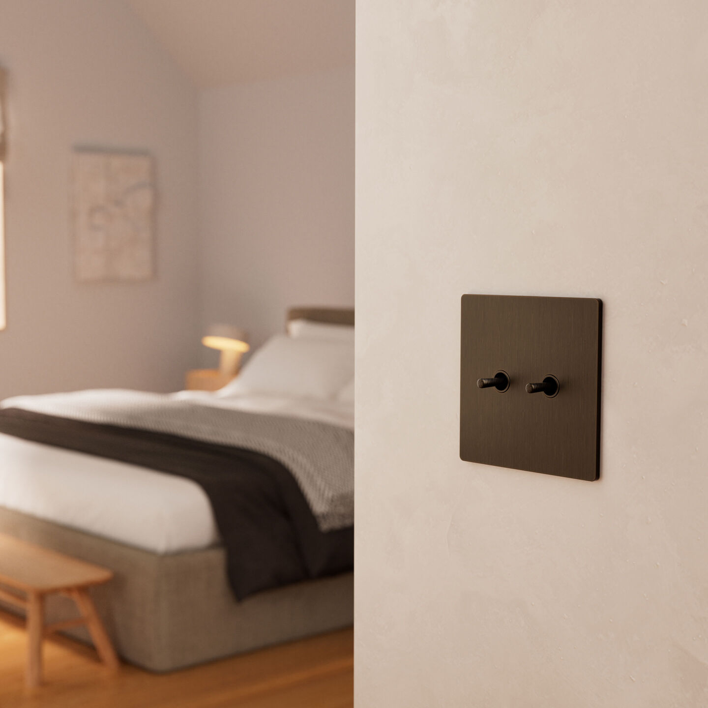 Lutron Avienna keypad in dark bronze installed in luxury bedroom setting