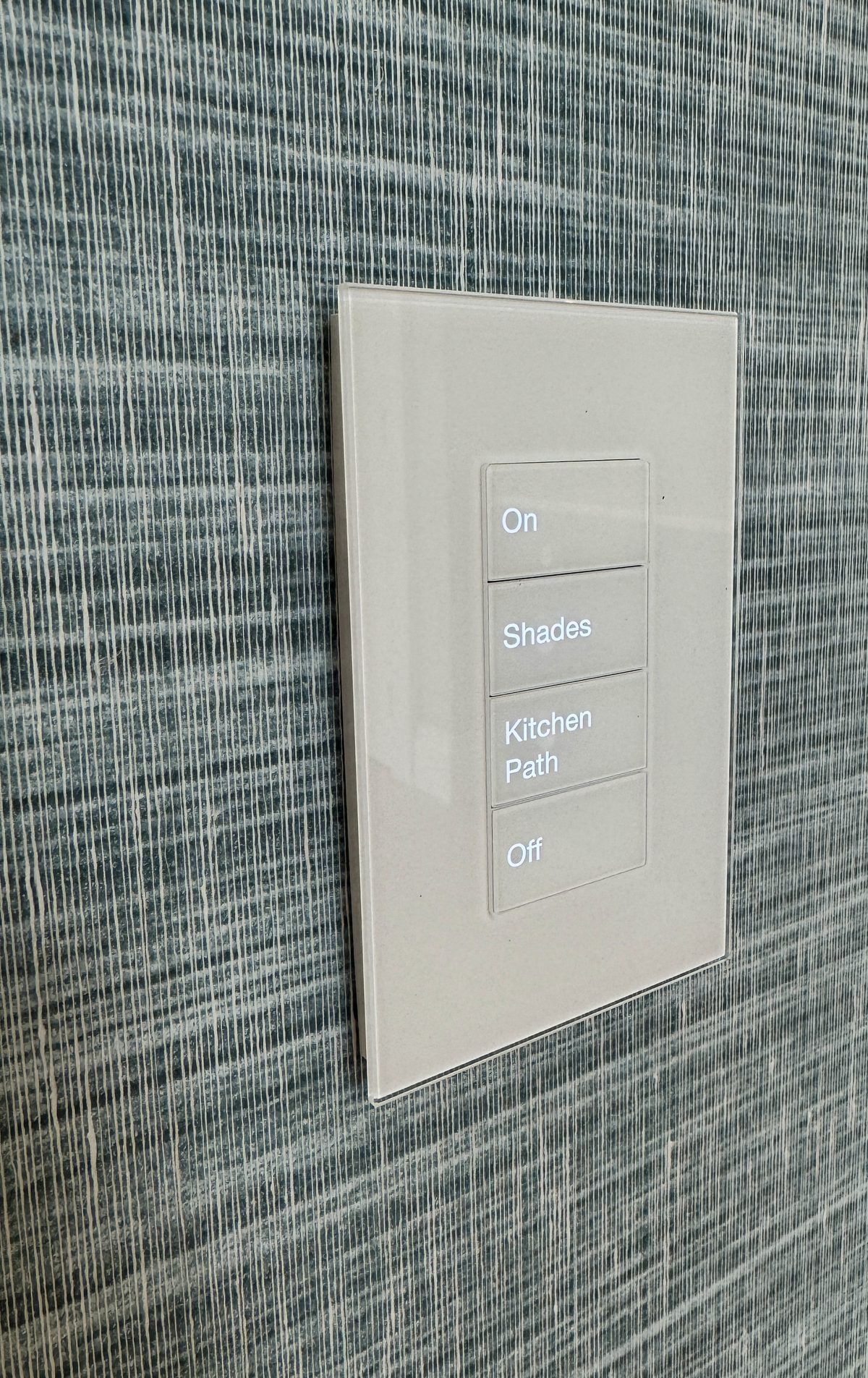 Lutron Palladiom glass keypad with On, Shades, Kitchen Path, and Off scene buttons